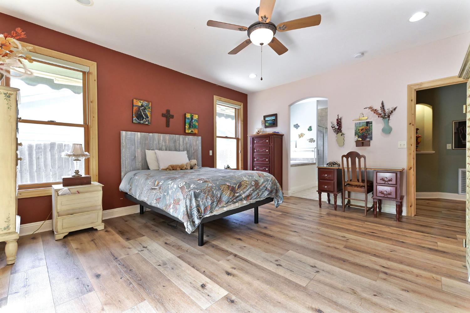 281 Oak Tree Circle Murphys, CA 95247 - Photo 20 of 96 a bedroom with a bed and wooden floor