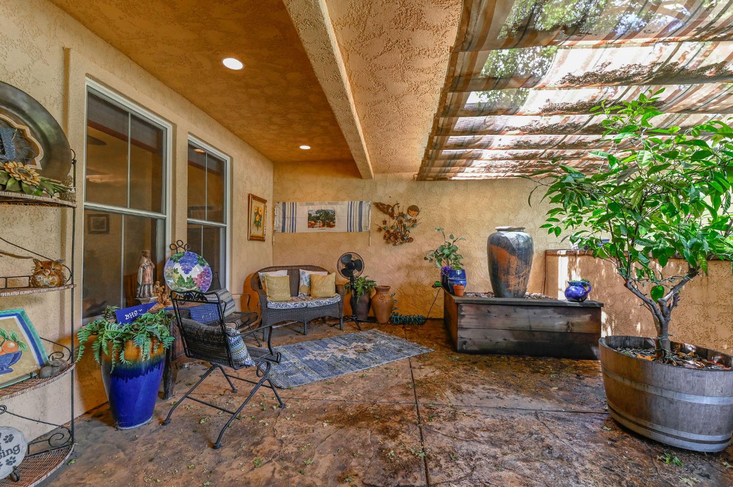 281 Oak Tree Circle Murphys, CA 95247 - Photo 2 of 96 a front view of a house with outdoor seating