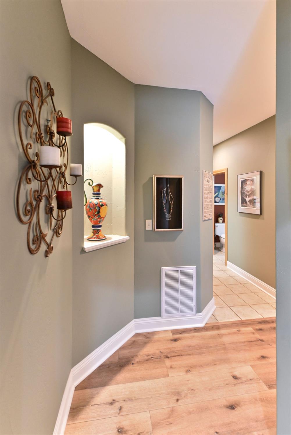 281 Oak Tree Circle Murphys, CA 95247 - Photo 29 of 96 a bedroom with a bed and a painting on the wall