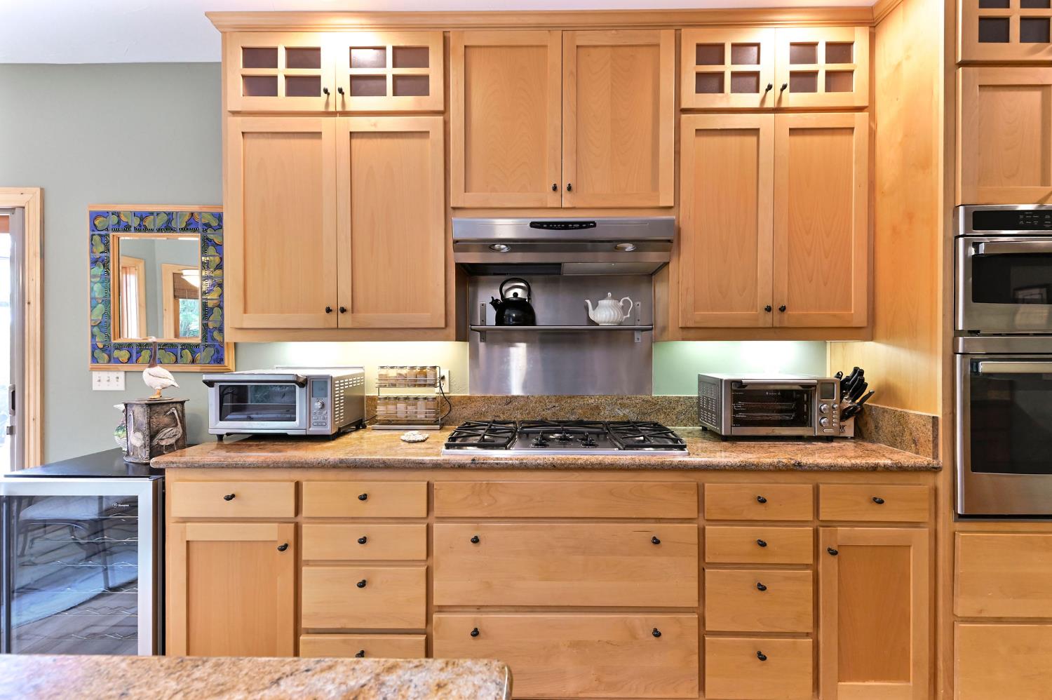 281 Oak Tree Circle Murphys, CA 95247 - Photo 45 of 96 a kitchen with granite countertop a sink and cabinets