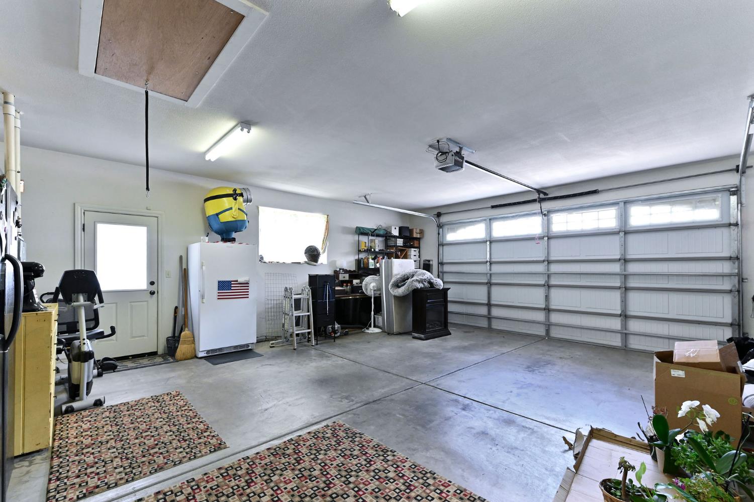 281 Oak Tree Circle Murphys, CA 95247 - Photo 52 of 96 a view of a garage with stuff