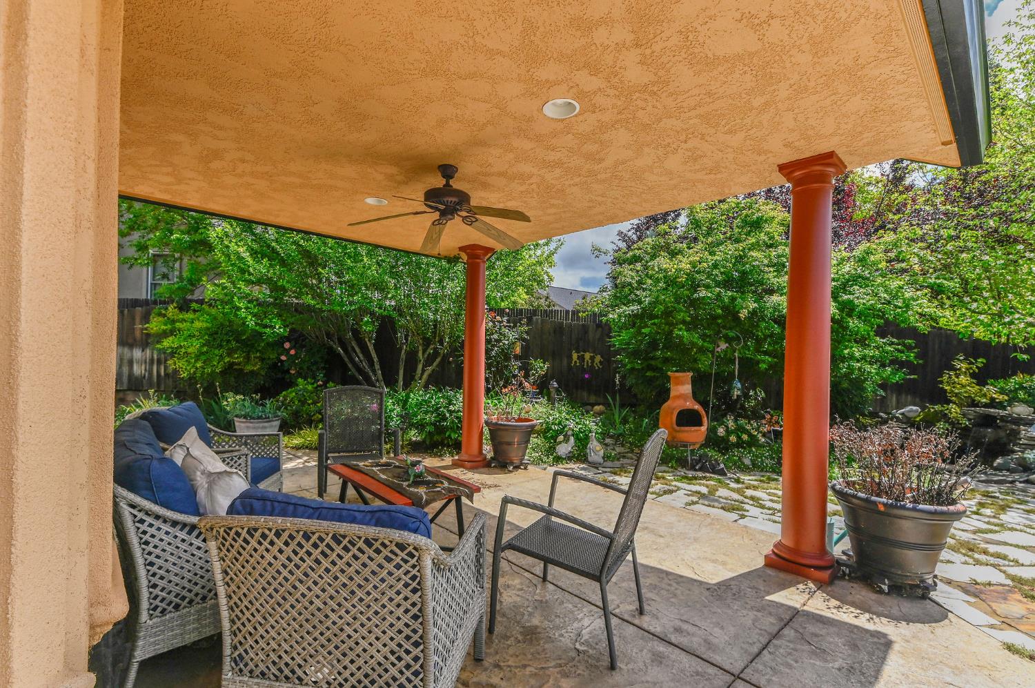 281 Oak Tree Circle Murphys, CA 95247 - Photo 60 of 96 a view of a patio with a table chairs and a backyard