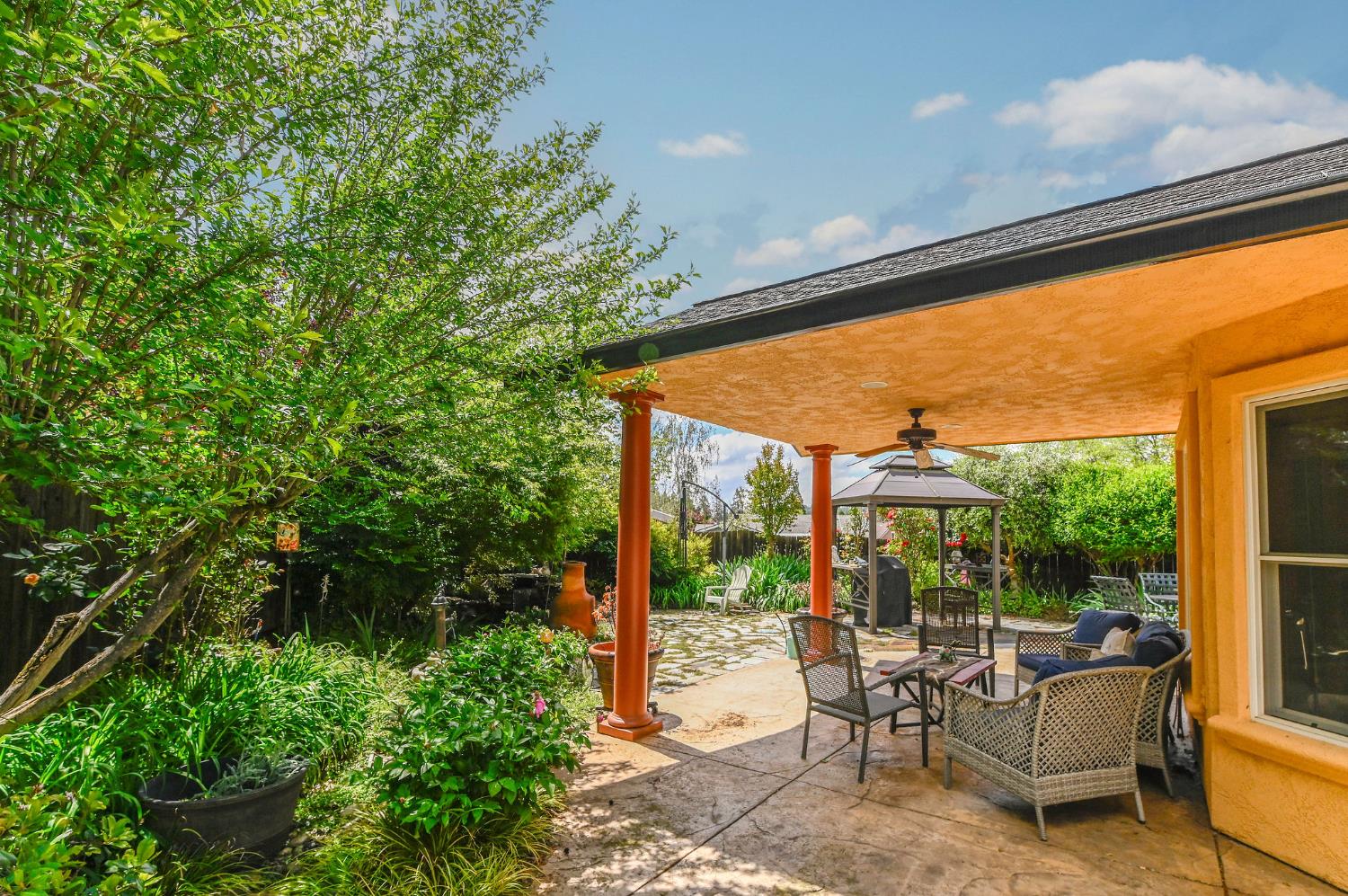 281 Oak Tree Circle Murphys, CA 95247 - Photo 65 of 96 a patio with yard glass top table and chairs