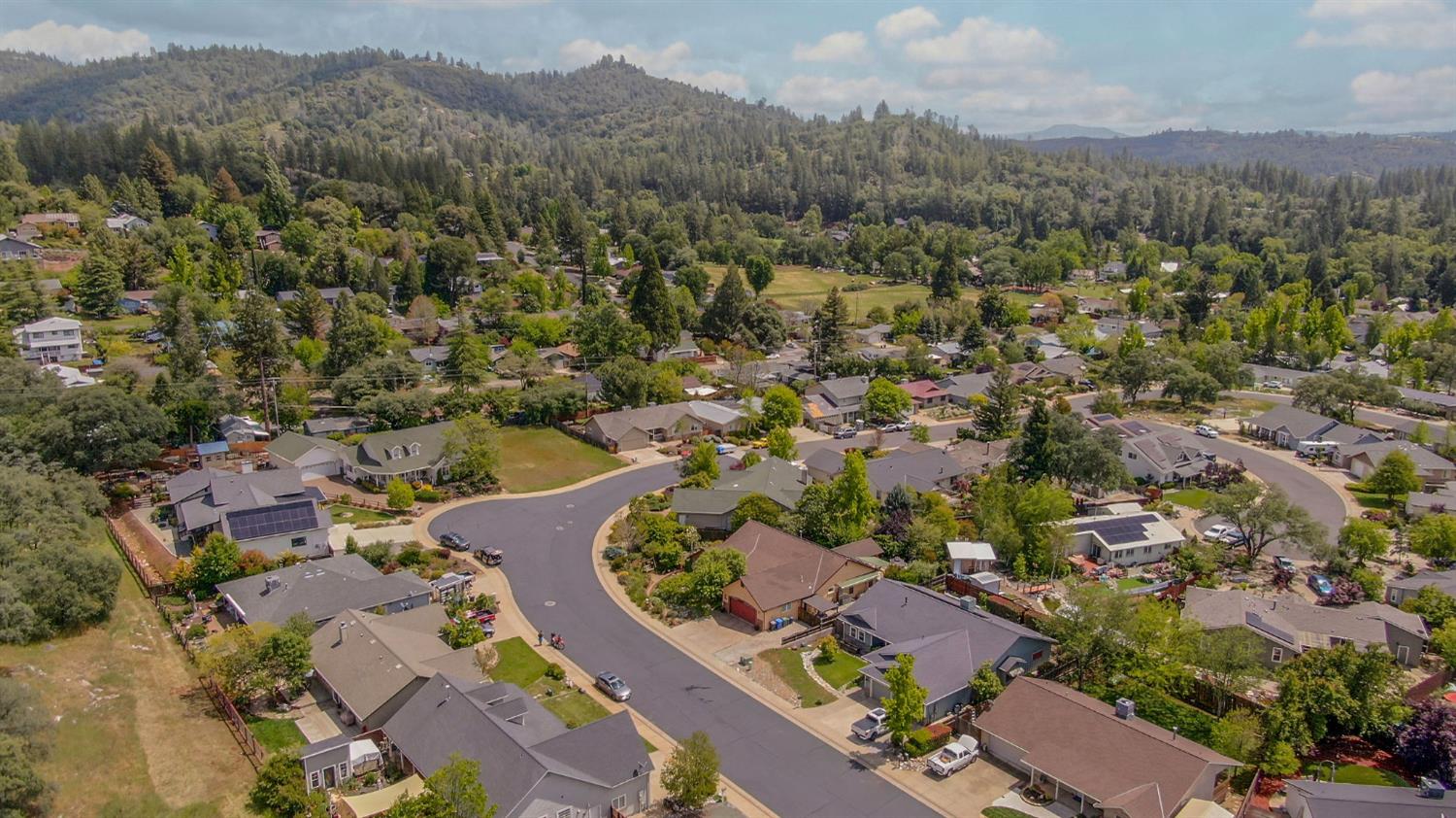 281 Oak Tree Circle Murphys, CA 95247 - Photo 96 of 96 an aerial view of a city with lots of residential buildings