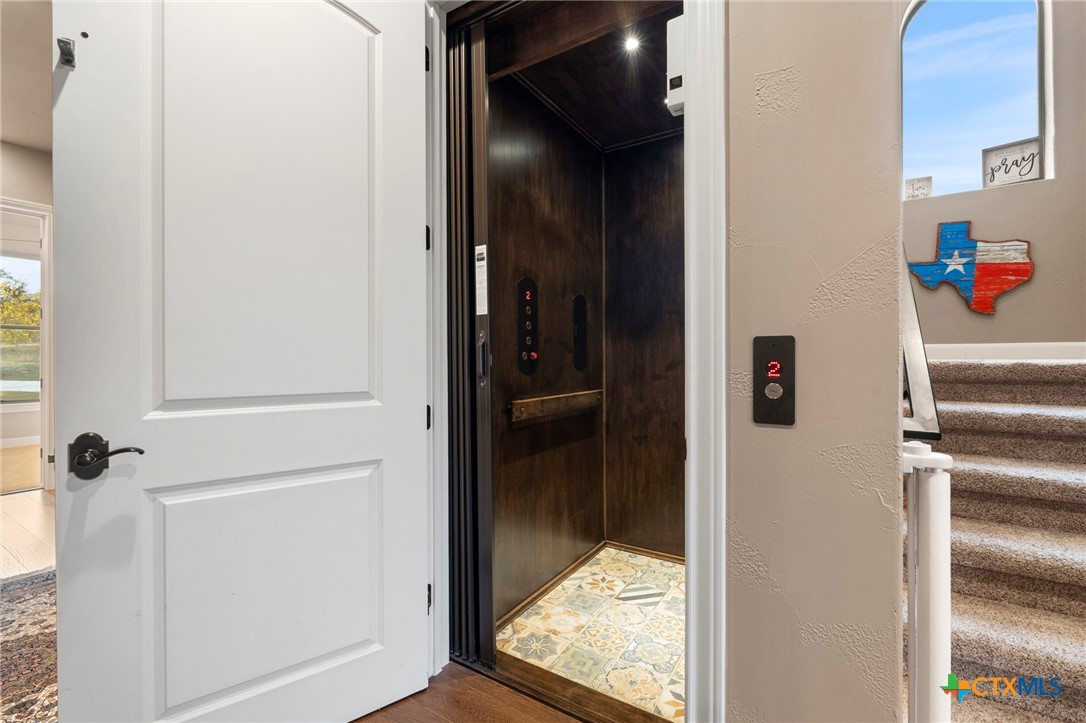 1039 Bluewater Place Spring Branch, TX 78070 - Photo 32 of 48 a view of hallway with wooden floor
