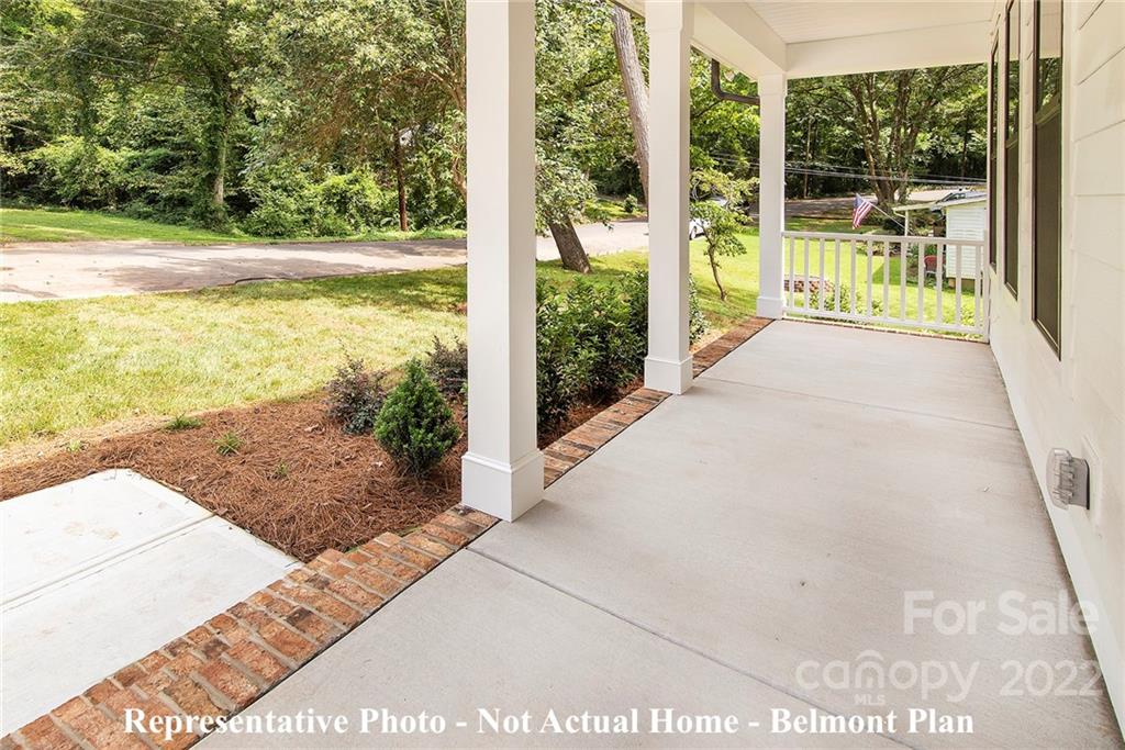 1362 High Shoals Road Lincolnton, NC 28092 - Photo 5 of 18 a view of balcony with floor to ceiling window next to a yard