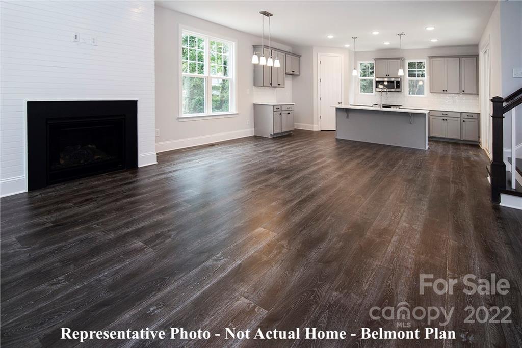 1362 High Shoals Road Lincolnton, NC 28092 - Photo 8 of 18 a view of kitchen with kitchen island wooden floor and center island