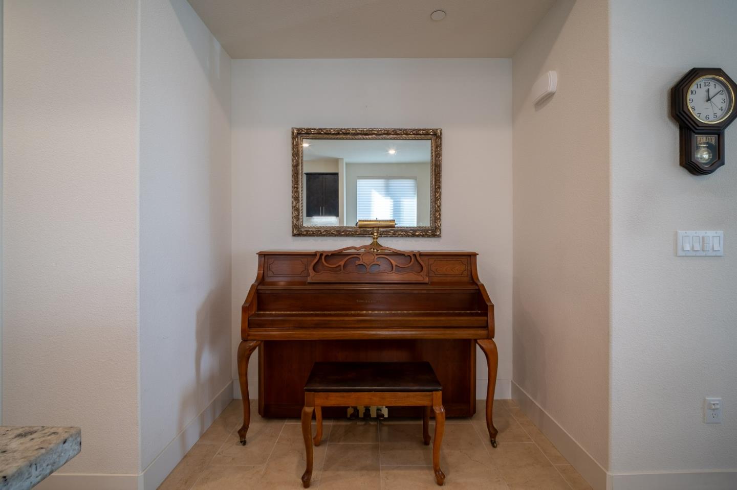 708 Eppleton Lane, Unit 204 Foster City, CA 94404 - Photo 18 of 46 a room with a piano and a table
