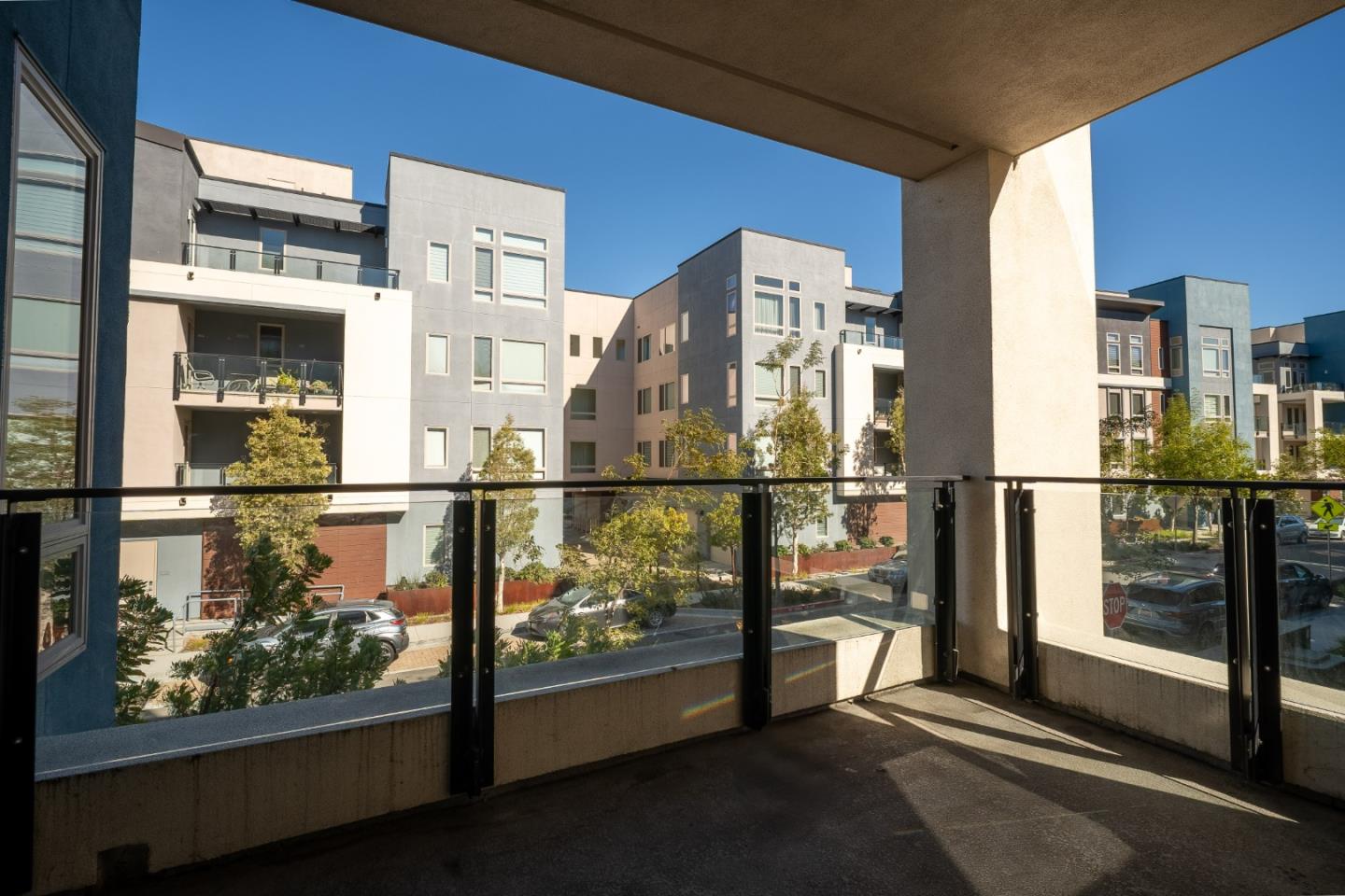 708 Eppleton Lane, Unit 204 Foster City, CA 94404 - Photo 26 of 46 a view of a balcony with wooden floor and outdoor space