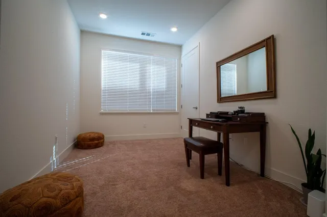 a room with furniture and a window