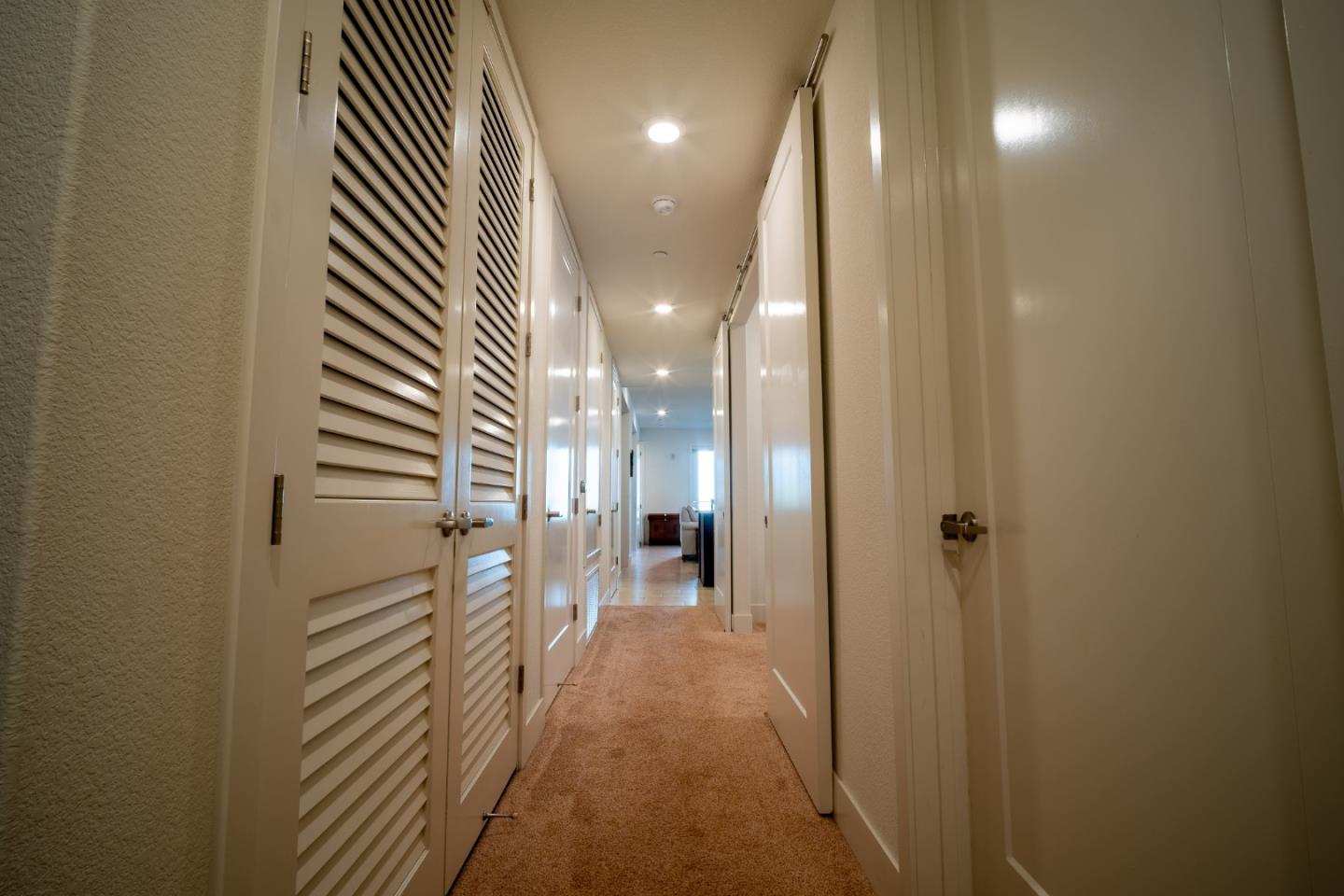 708 Eppleton Lane, Unit 204 Foster City, CA 94404 - Photo 34 of 46 a view of a hallway with a dining area