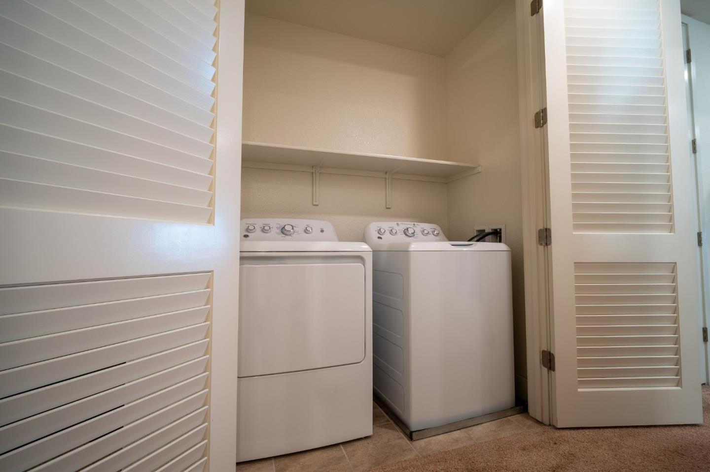 708 Eppleton Lane, Unit 204 Foster City, CA 94404 - Photo 37 of 46 a utility room with dryer and washer
