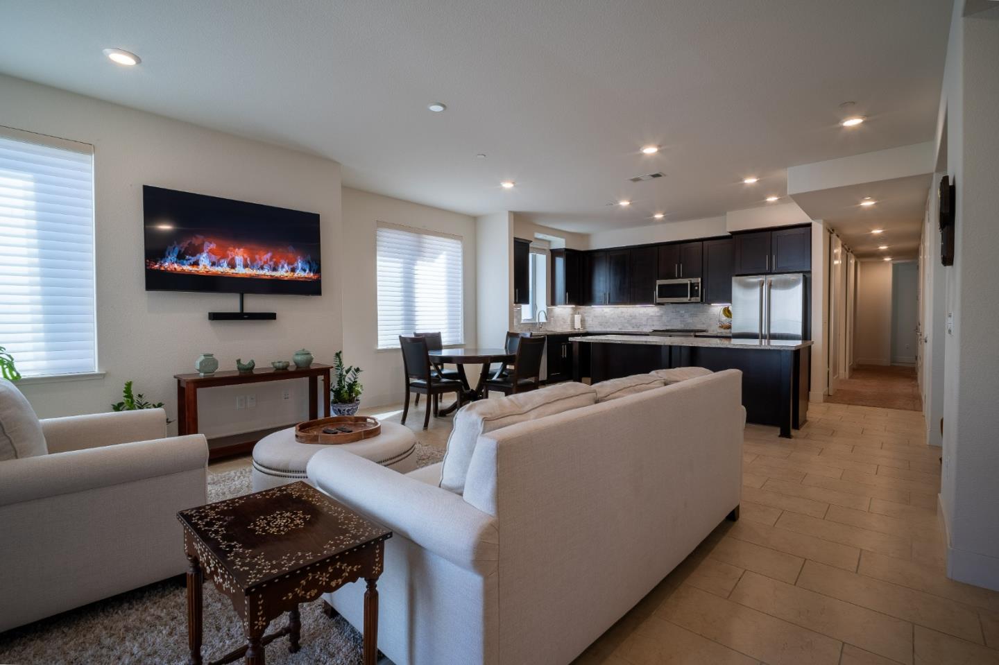 708 Eppleton Lane, Unit 204 Foster City, CA 94404 - Photo 5 of 46 a living room with furniture and a flat screen tv
