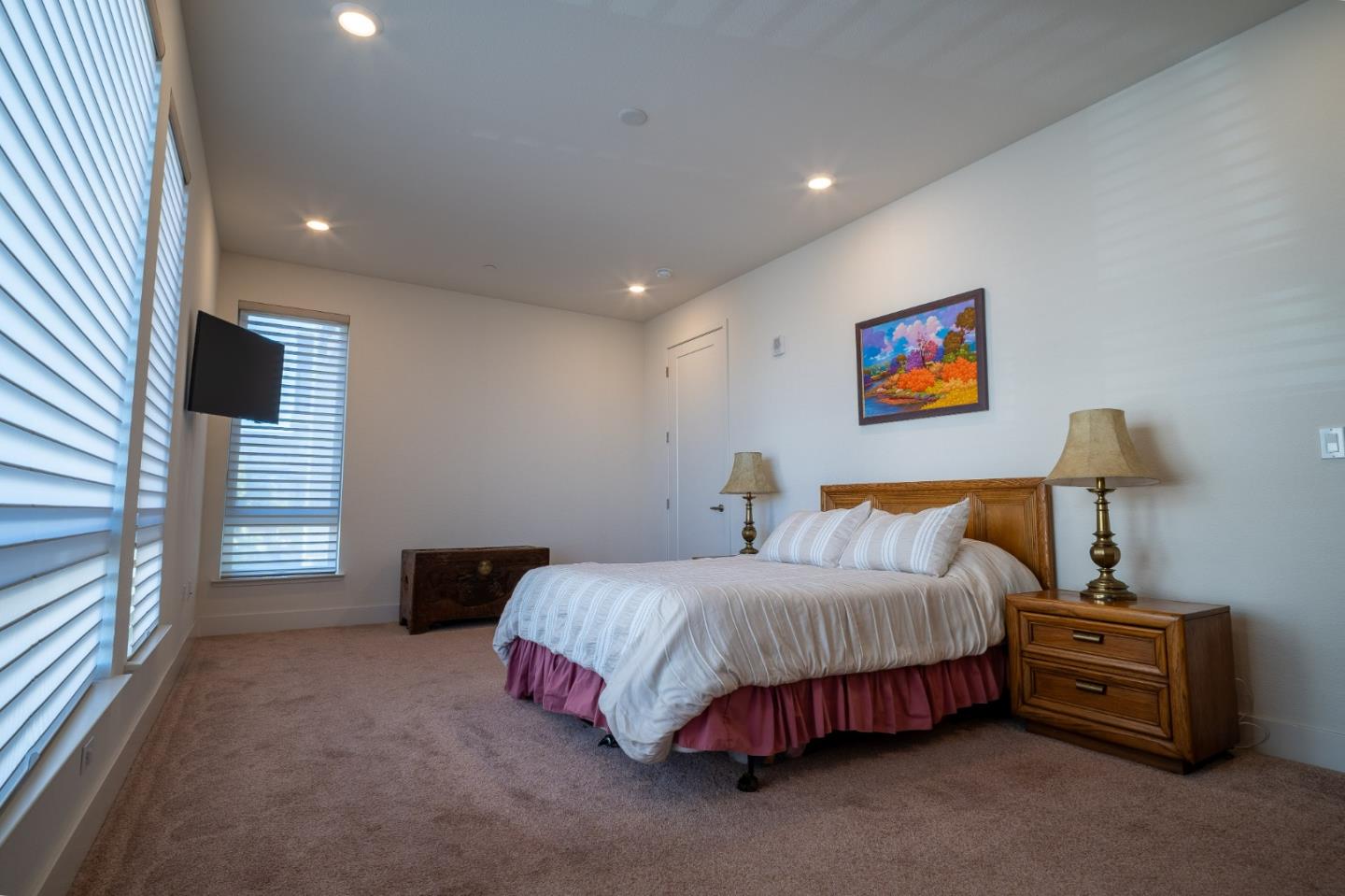 708 Eppleton Lane, Unit 204 Foster City, CA 94404 - Photo 10 of 46 a bedroom with a bed and a night stand