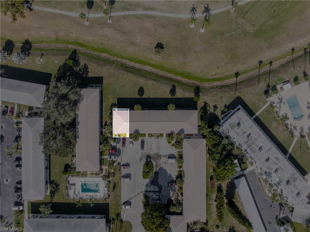345 Joel Boulevard, Unit 110 Lehigh Acres, FL 33936 - Photo 5 of 47 an aerial view of a house