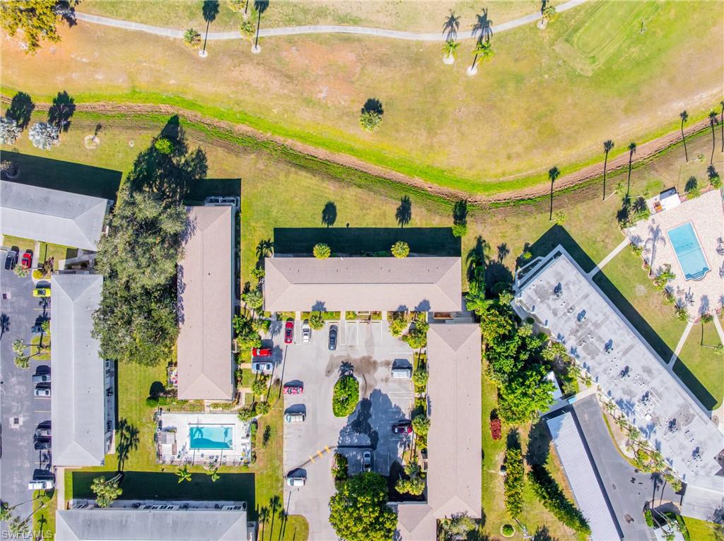 345 Joel Boulevard, Unit 110 Lehigh Acres, FL 33936 - Photo 6 of 47 an aerial view of a building