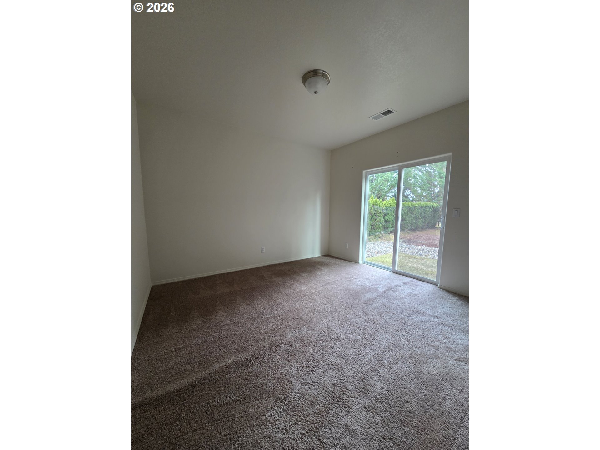 376 Bentgrass Court Sutherlin, OR 97479 - Photo 14 of 17 a view of a room with a floor to ceiling window