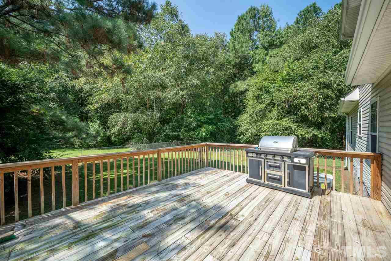 190 Landmark Road Willow Spring, NC 27592 - Photo 19 of 25 a view of balcony with deck and wooden floor