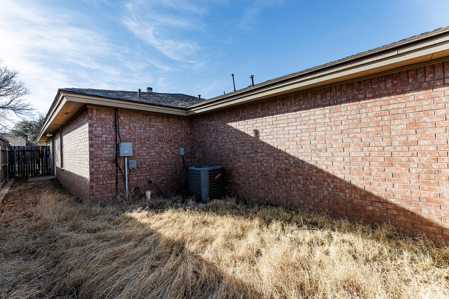 9713 Joliet Avenue Lubbock, TX 79423 - Photo 18 of 18 a backyard of a house