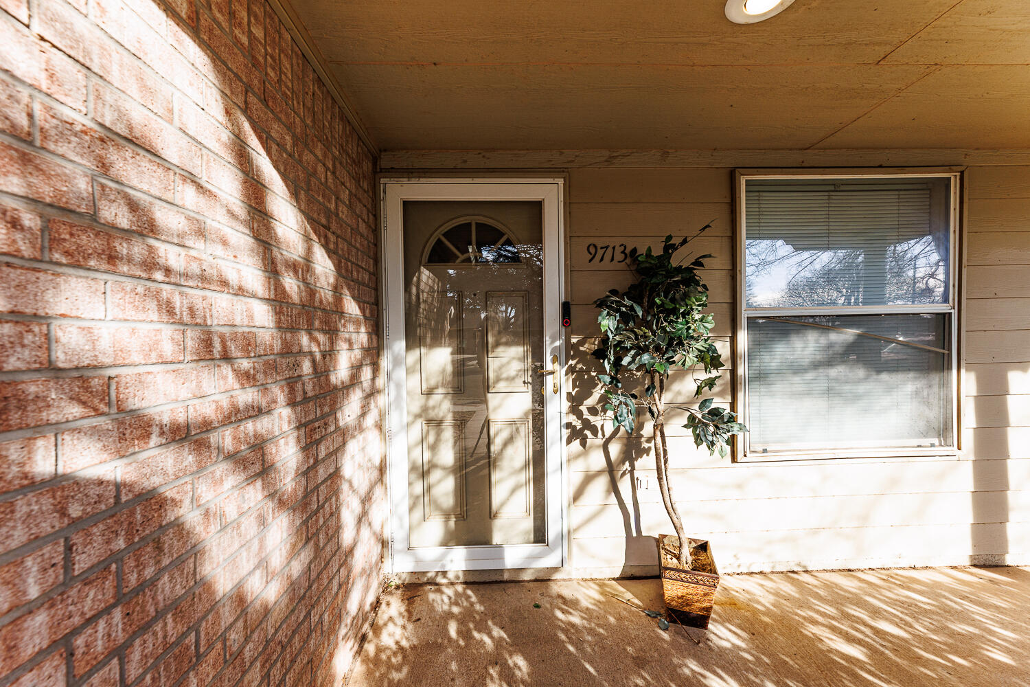 9713 Joliet Avenue Lubbock, TX 79423 - Photo 6 of 18 a view of a porch