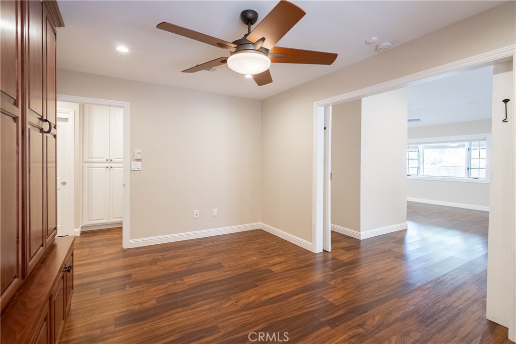5965 Maybrook Circle Riverside, CA 92506 - Photo 14 of 25 wooden floor in an empty room with a window