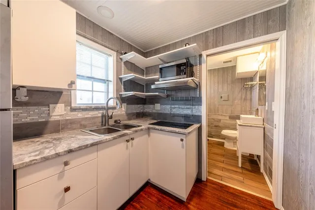 a view of a chairs and table in the patio