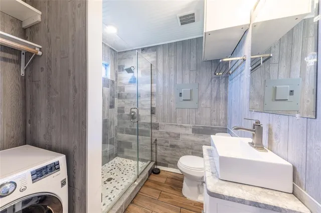 a kitchen with a sink and a refrigerator