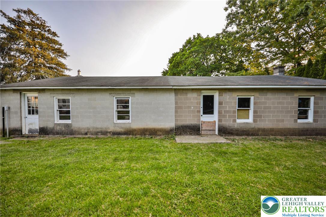 1770 Weilers Road Lower Macungie Township, PA 18011 - Photo 15 of 29 a backyard of a house with wooden floor and fence