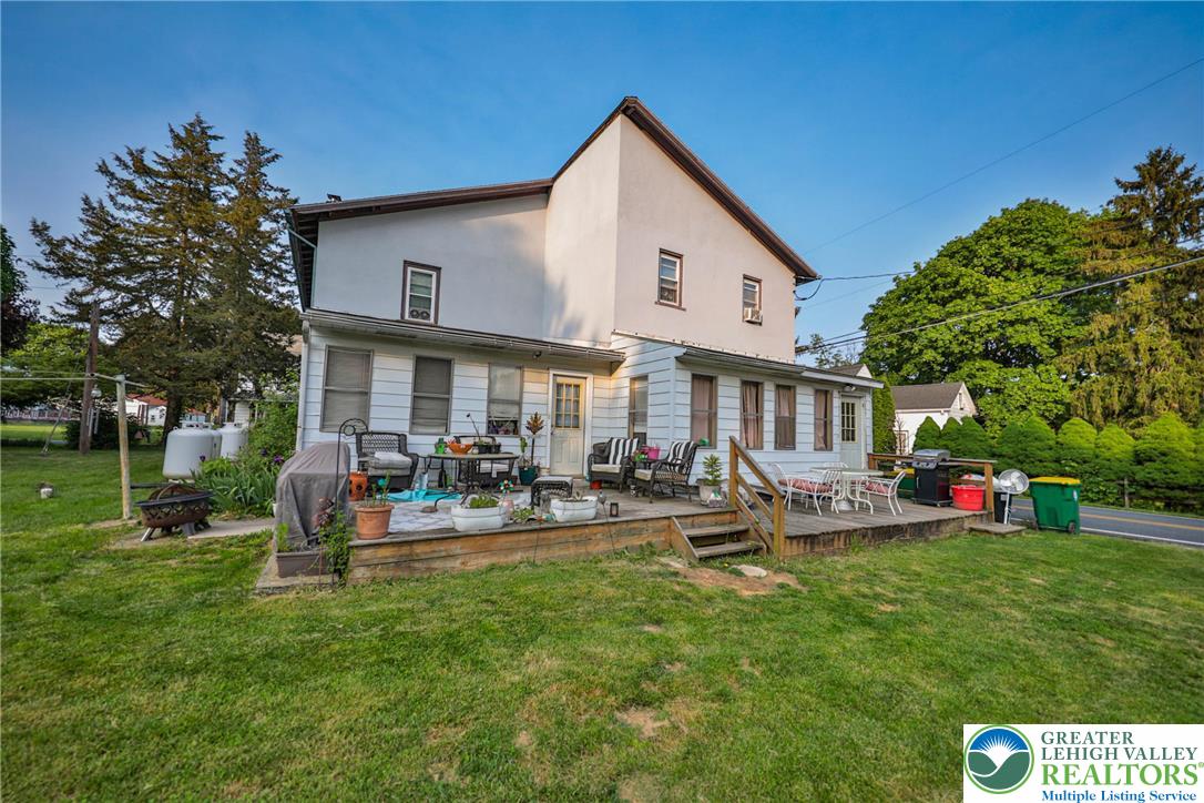 1770 Weilers Road Lower Macungie Township, PA 18011 - Photo 17 of 29 a front view of a house with garden and sitting area