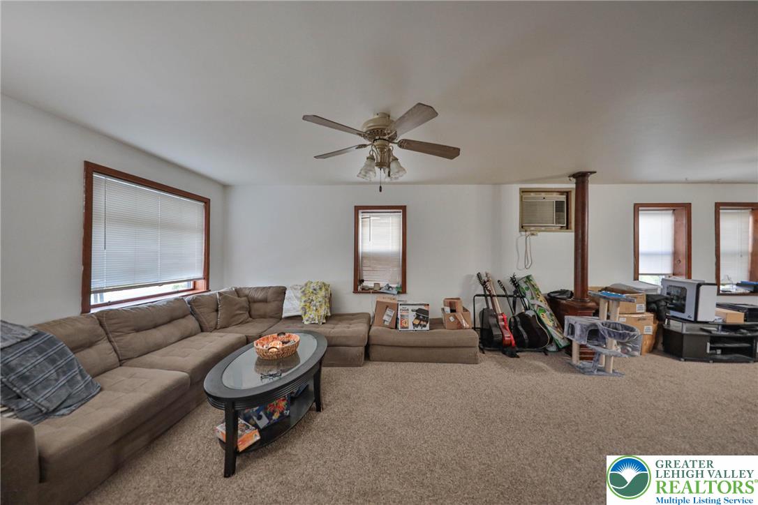 1770 Weilers Road Lower Macungie Township, PA 18011 - Photo 22 of 29 a living room with furniture and a window