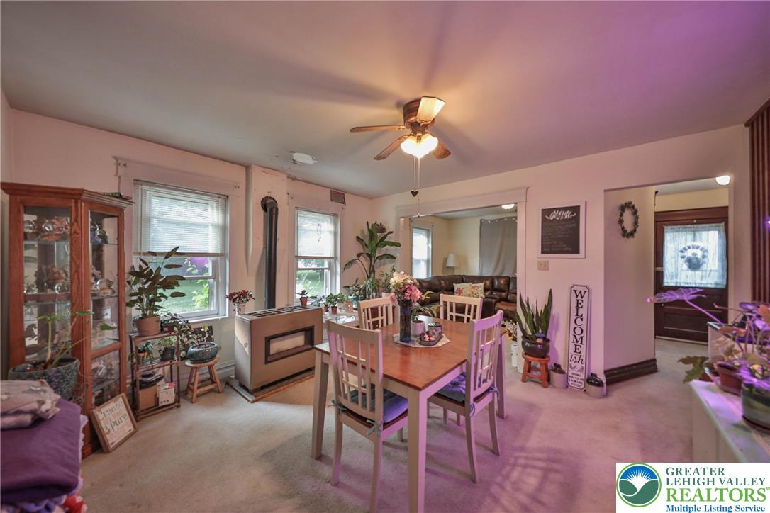 1770 Weilers Road Lower Macungie Township, PA 18011 - Photo 27 of 29 a view of a livingroom with furniture window and wooden floor