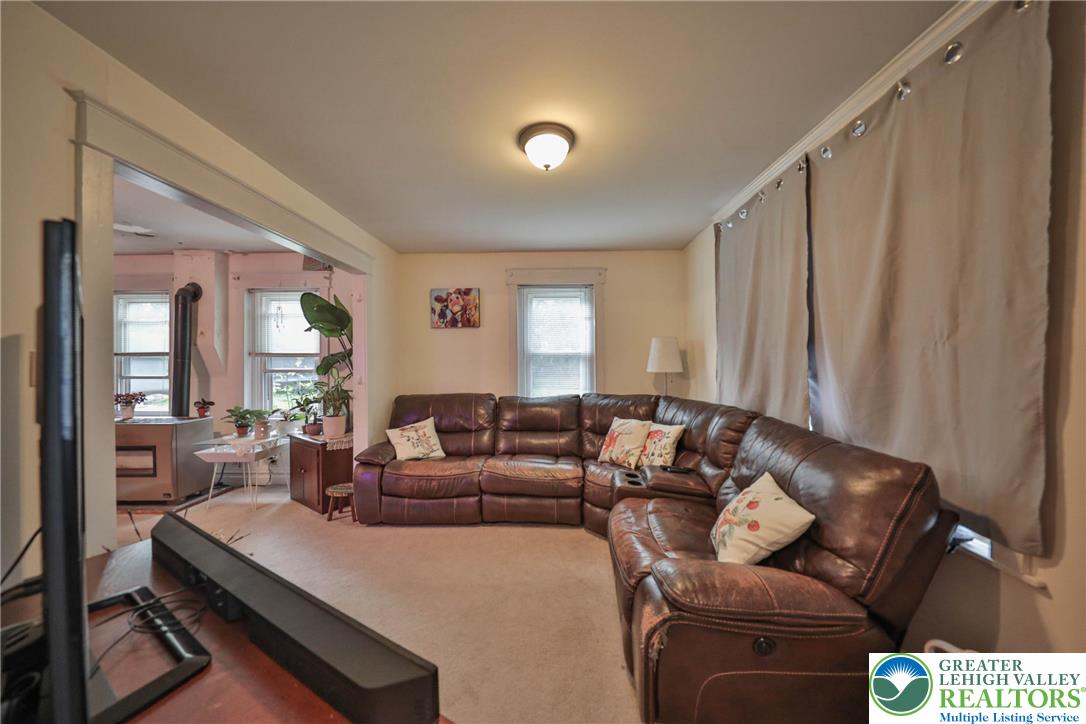 1770 Weilers Road Lower Macungie Township, PA 18011 - Photo 5 of 29 a living room with furniture and a large window