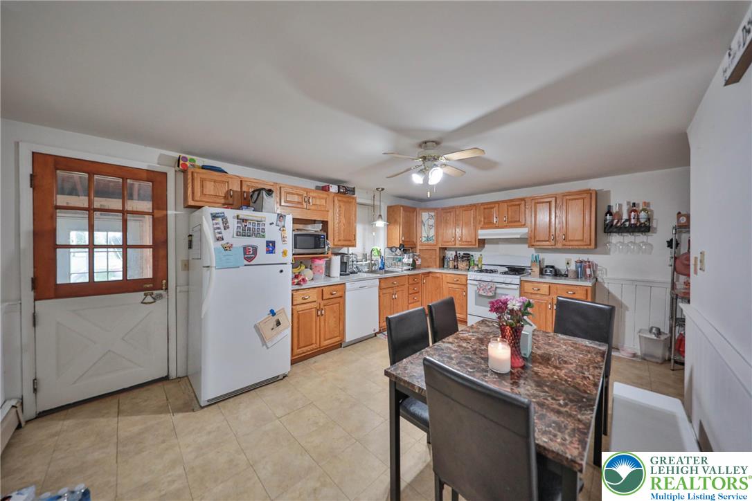 1770 Weilers Road Lower Macungie Township, PA 18011 - Photo 9 of 29 a dining room with furniture and a kitchen