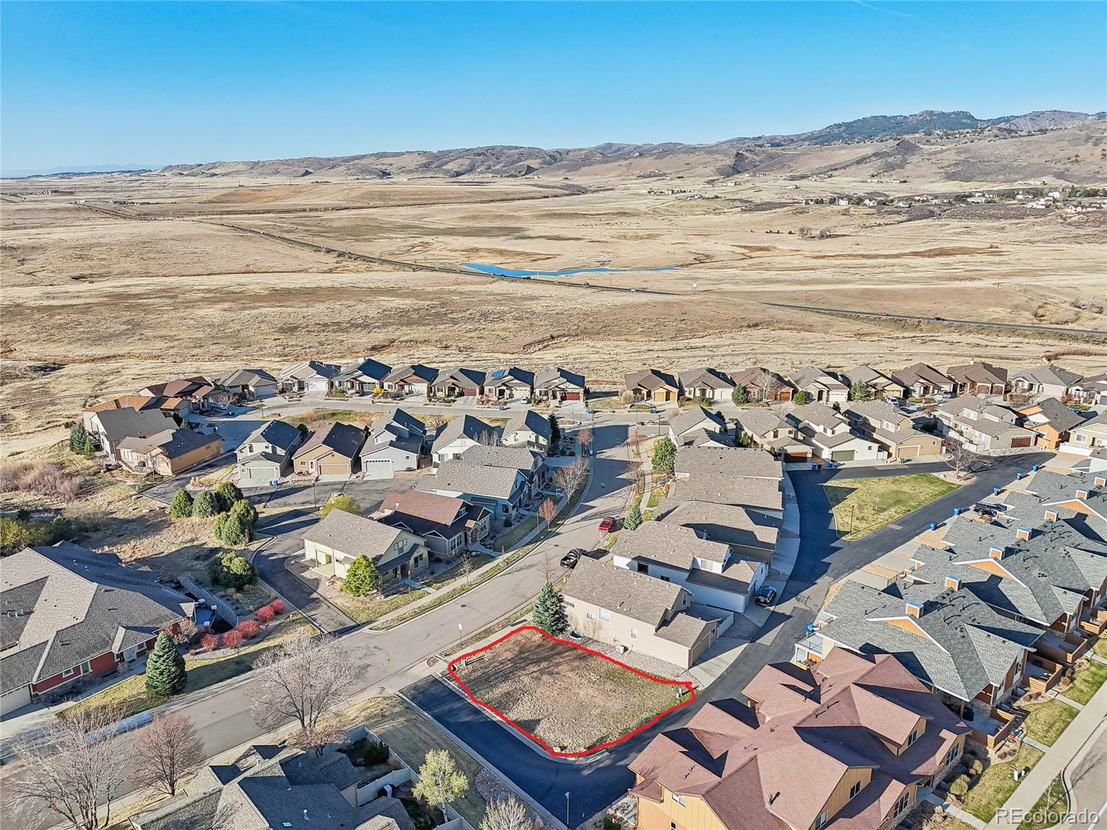 1802 Prairie Ridge Drive Fort Collins, CO 80526 - Photo 2 of 14 a view of an ocean and beach