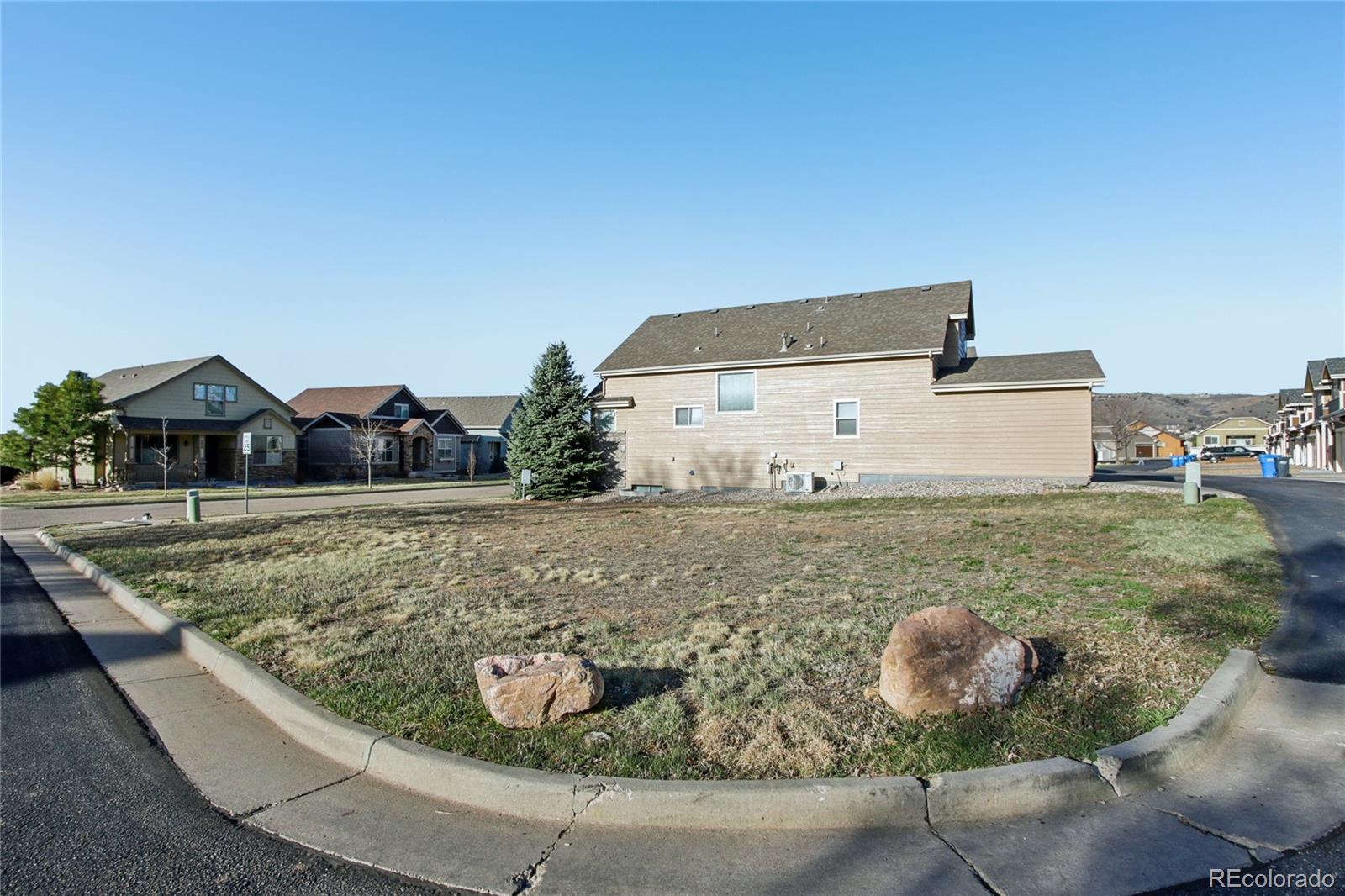 1802 Prairie Ridge Drive Fort Collins, CO 80526 - Photo 4 of 14 a view of houses with sky view