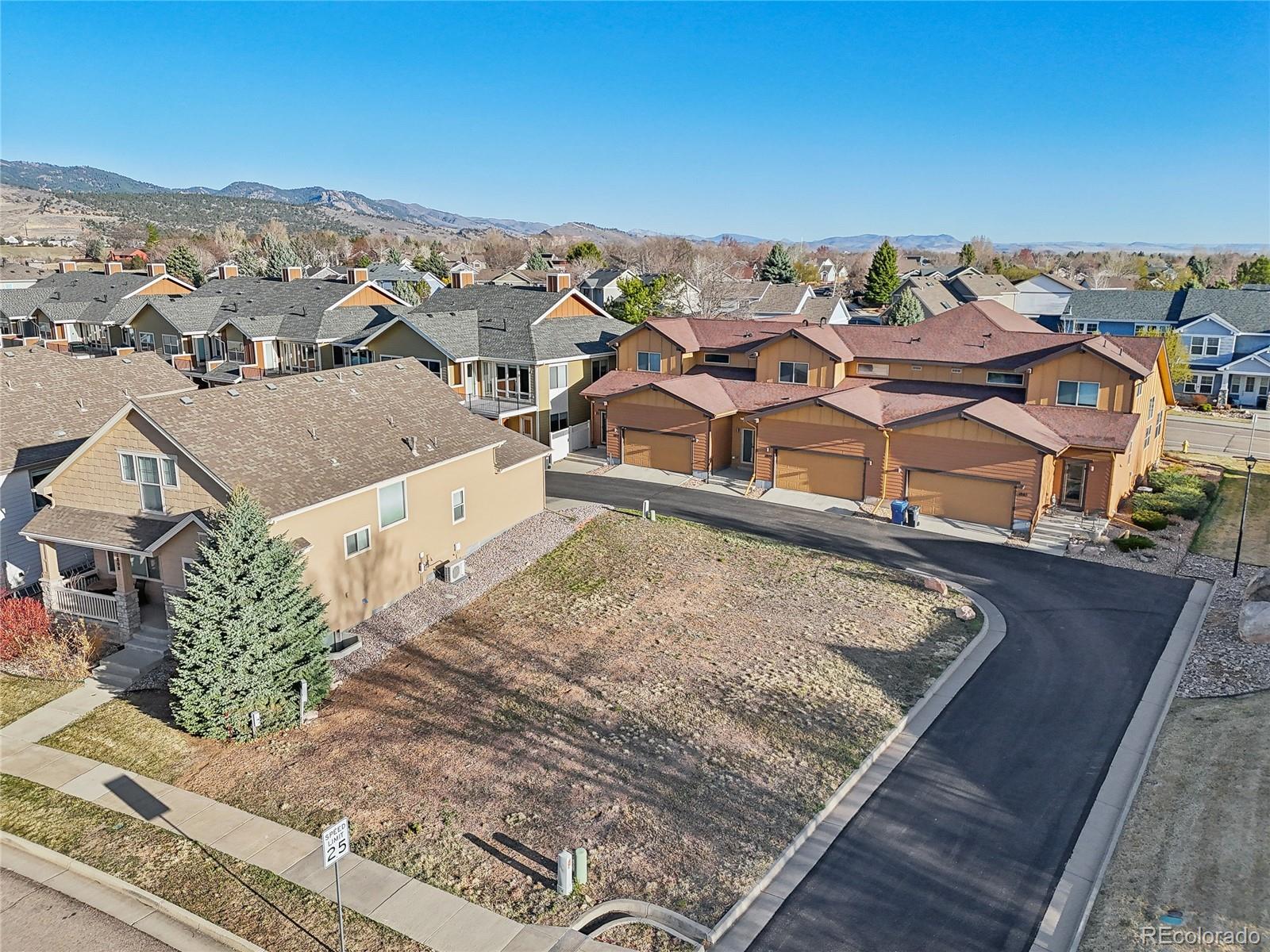 1802 Prairie Ridge Drive Fort Collins, CO 80526 - Photo 7 of 14 an aerial view of residential houses with outdoor space