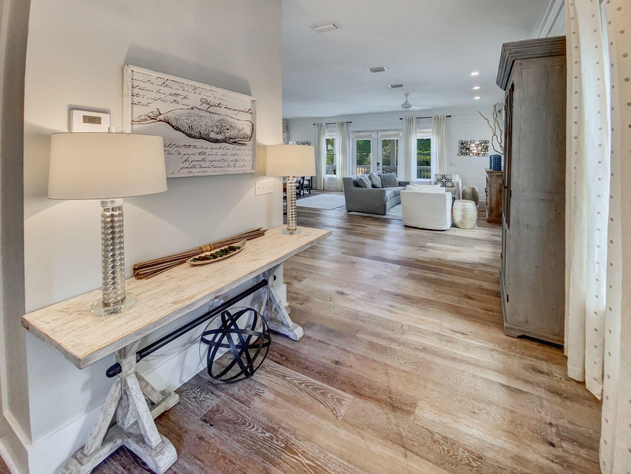 158 East Blue Crab Loop Inlet Beach, FL 32461 - Photo 10 of 43 a living room with furniture and a wooden floor