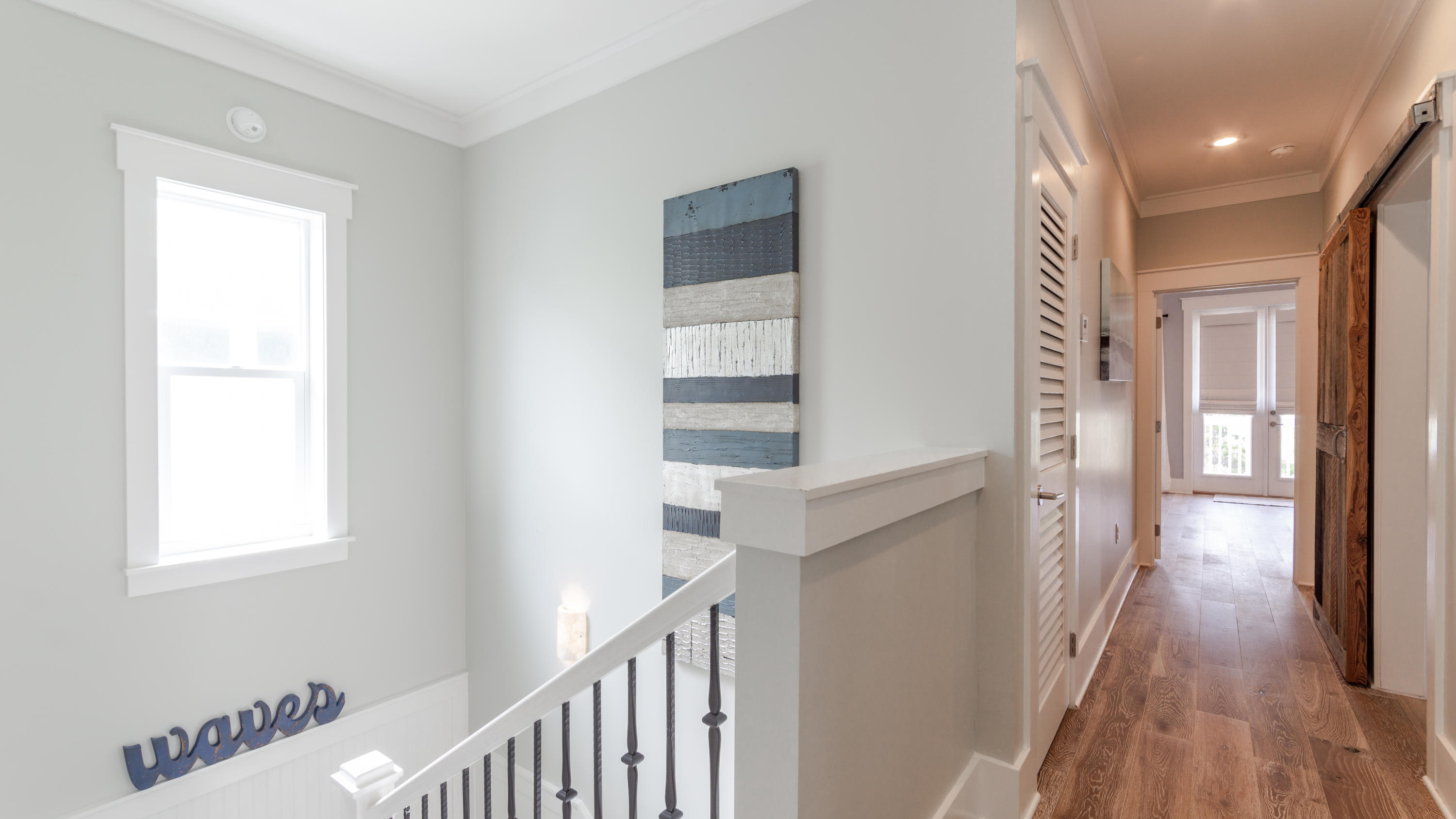 158 East Blue Crab Loop Inlet Beach, FL 32461 - Photo 17 of 43 a view of a hallway with a window