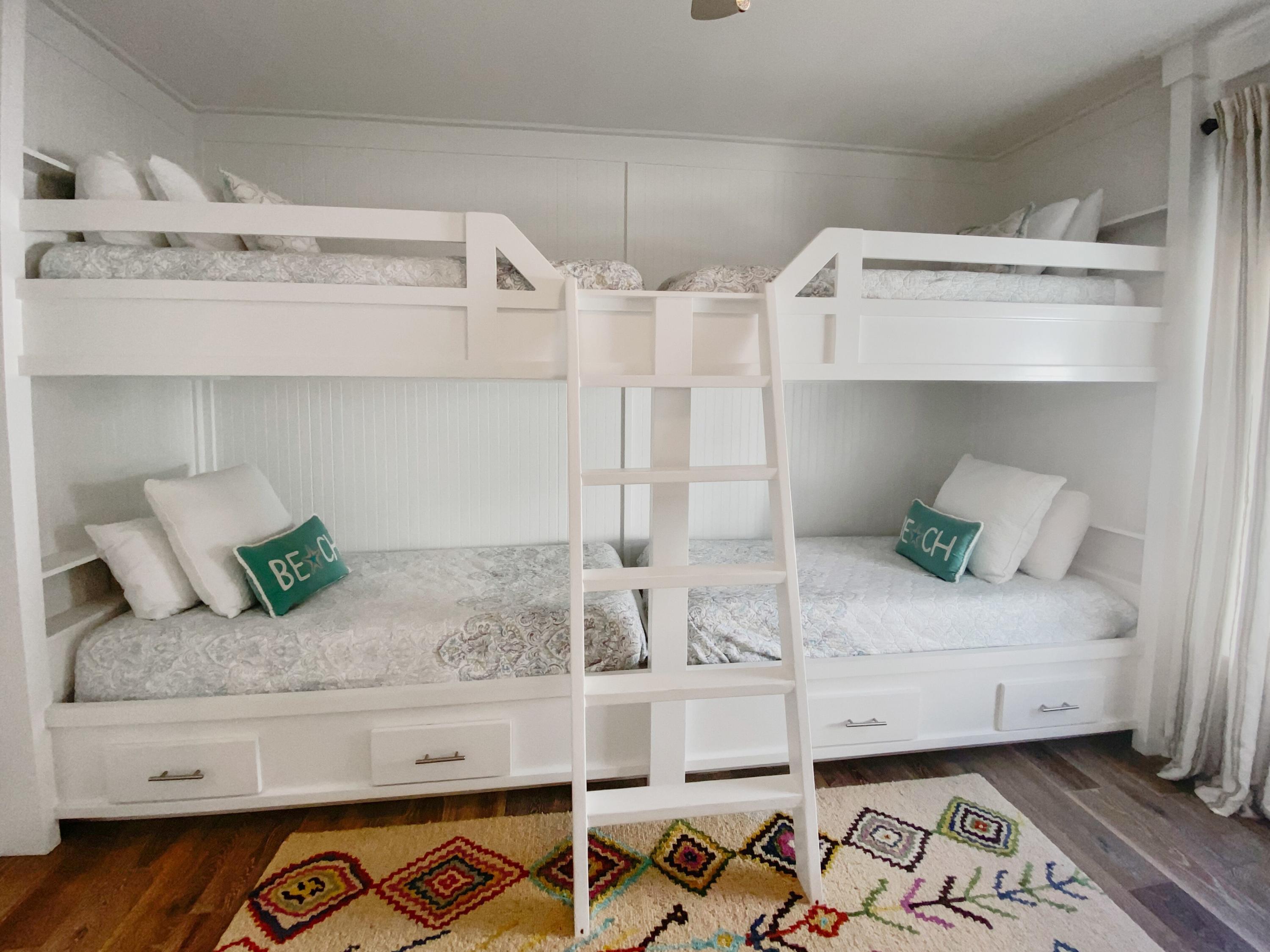 158 East Blue Crab Loop Inlet Beach, FL 32461 - Photo 25 of 43 a bedroom with a bed and ceiling fan