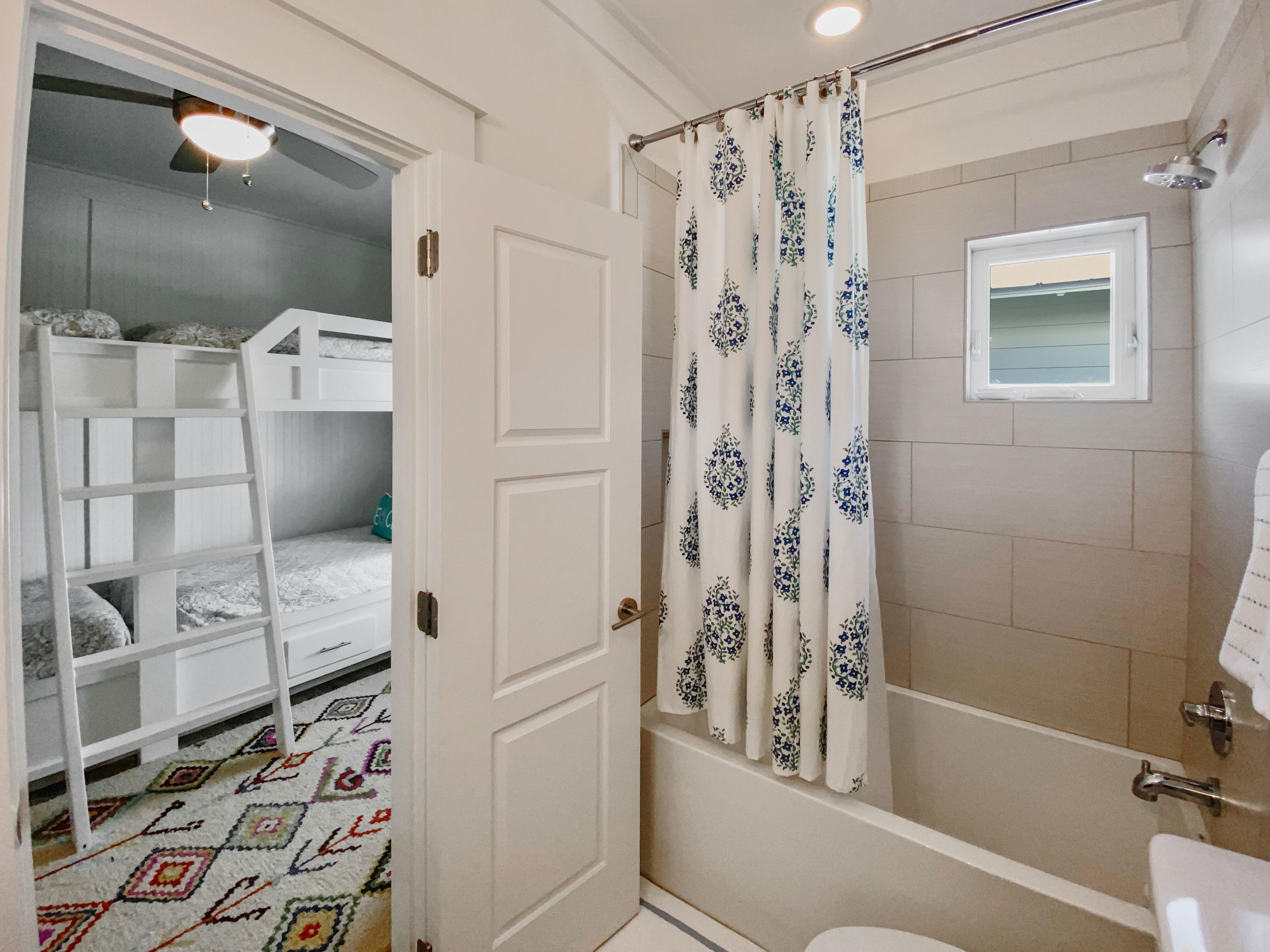 158 East Blue Crab Loop Inlet Beach, FL 32461 - Photo 26 of 43 a bathroom with a shower and a tub