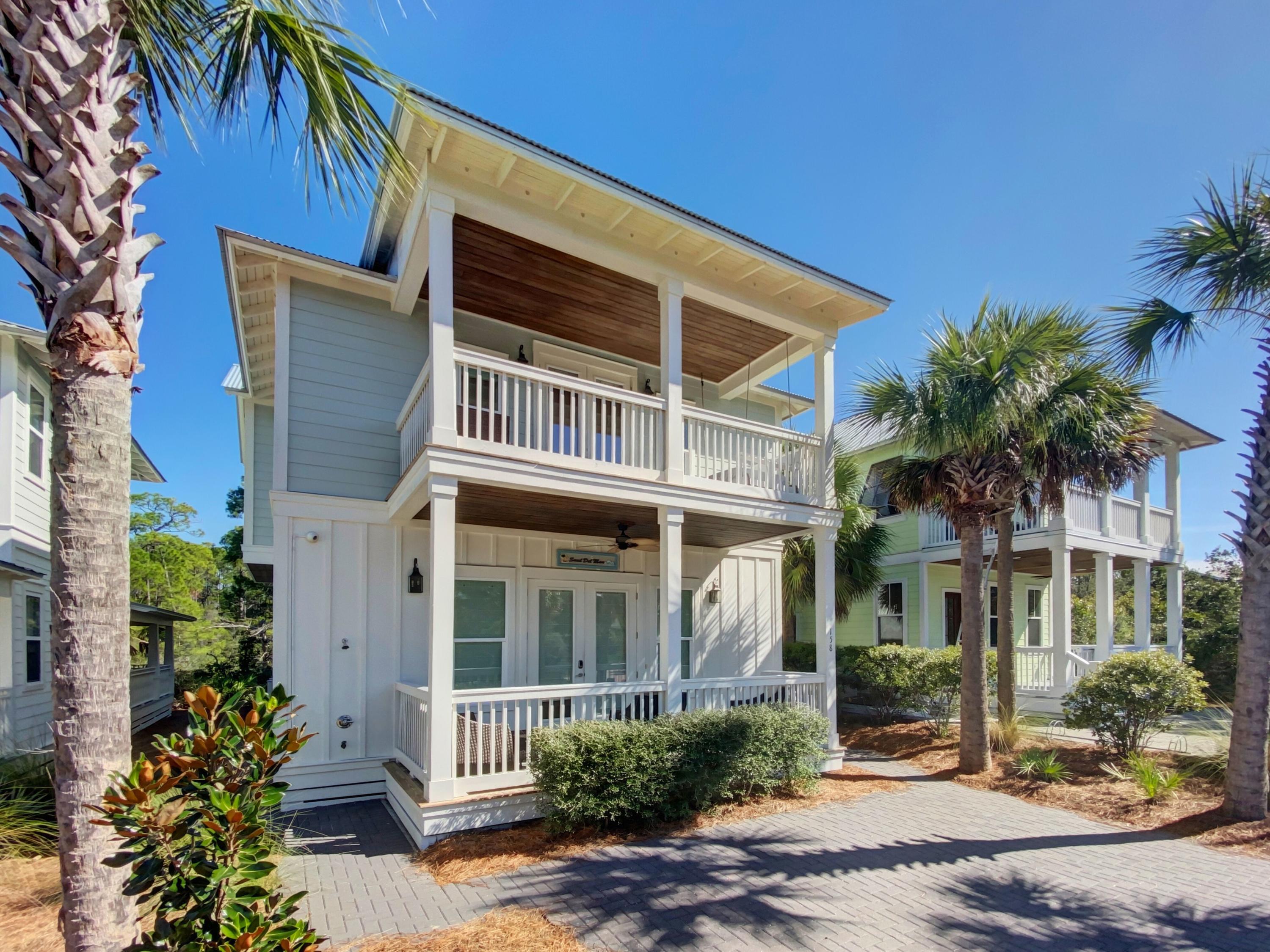 158 East Blue Crab Loop Inlet Beach, FL 32461 - Photo 40 of 43 a front view of a house with a yard
