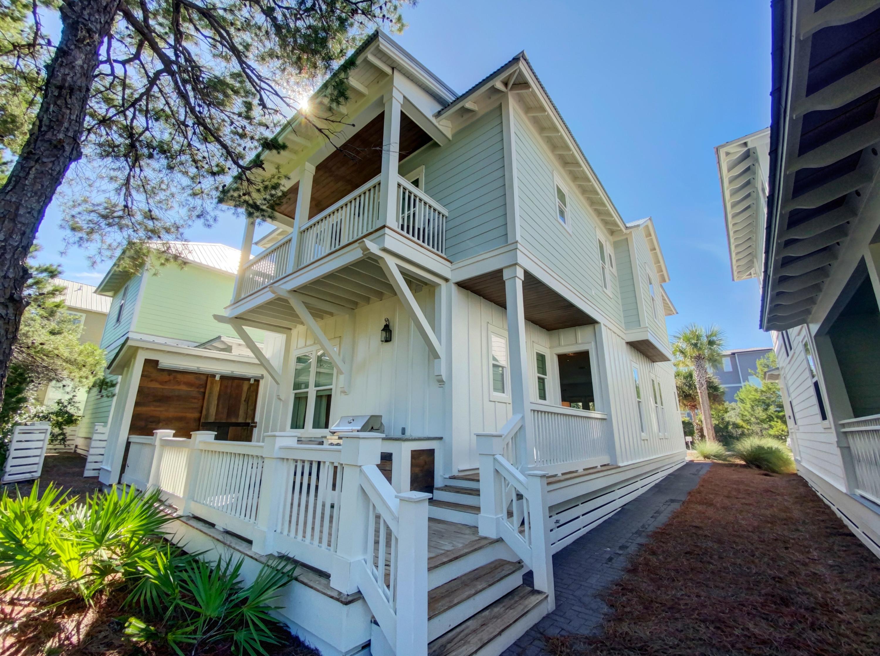 158 East Blue Crab Loop Inlet Beach, FL 32461 - Photo 41 of 43 a view of a house with a small yard