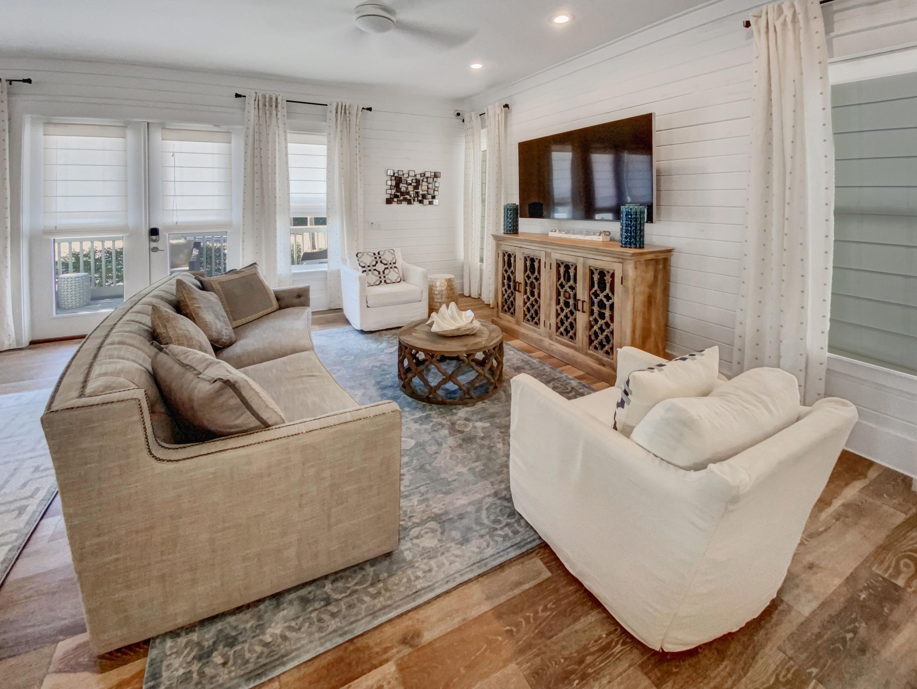 158 East Blue Crab Loop Inlet Beach, FL 32461 - Photo 8 of 43 a living room with furniture and a flat screen tv