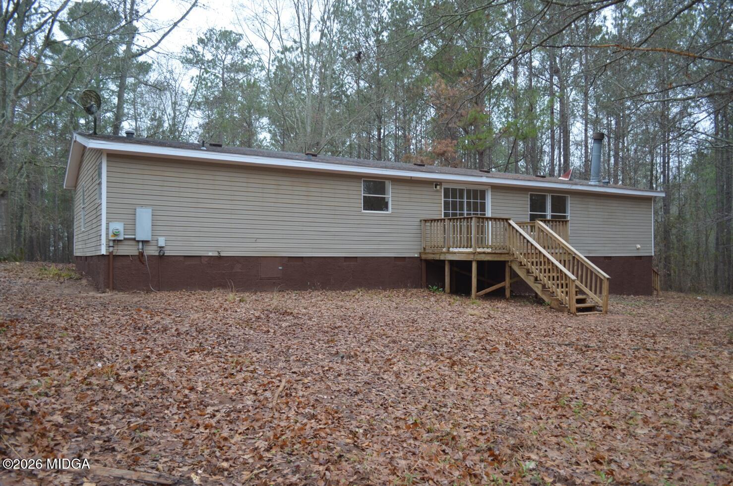 1048 Lee King Road Forsyth, GA 31029 - Photo 17 of 19 front view of house with a yard