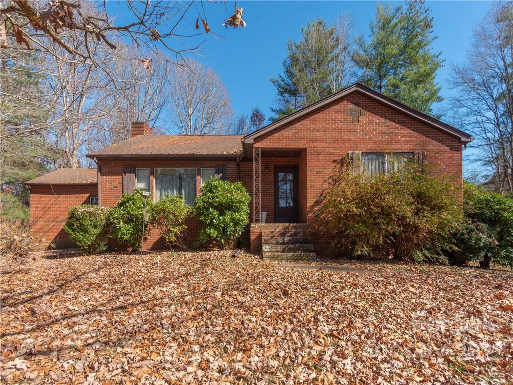 147 Crossroad Hill Road Canton, NC 28716 - Photo 1 of 20 a front view of a house with a yard
