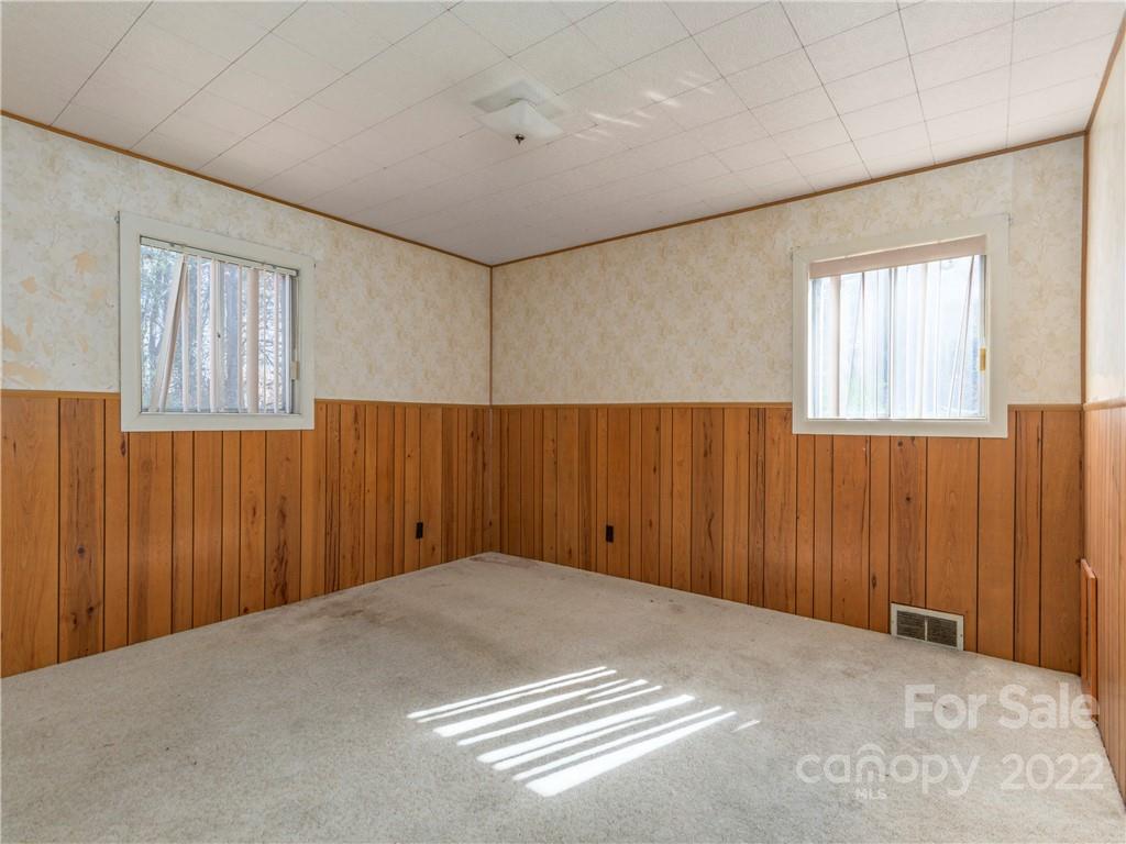 147 Crossroad Hill Road Canton, NC 28716 - Photo 11 of 20 an empty room with windows