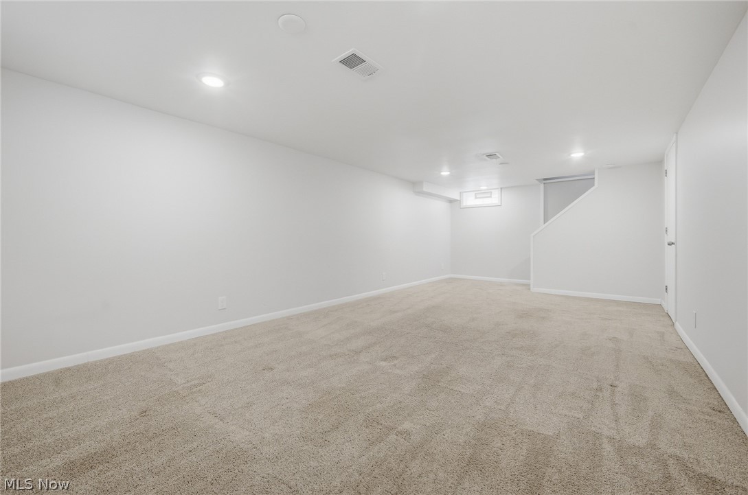 3722 Lindholm Road Shaker Heights, OH 44120 - Photo 30 of 34 Spacious room featuring light-colored carpeting, white walls, and recessed lighting