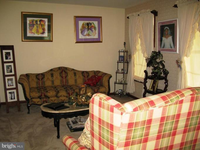 9025 Fieldchat Road Nottingham, MD 21236 - Photo 5 of 11 a living room with furniture