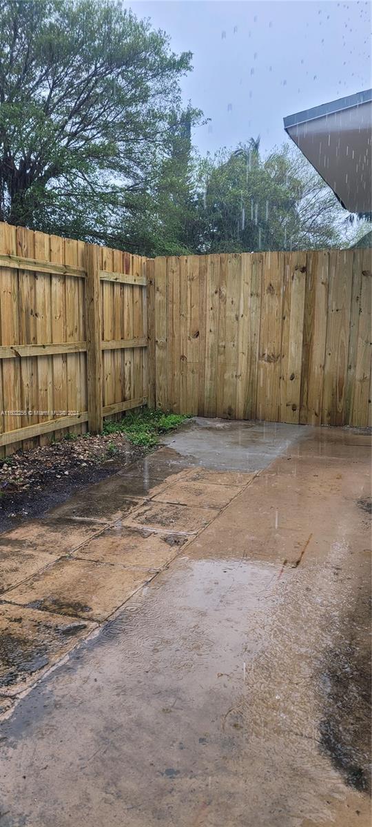 567 Northwest 90th Street, Unit 3 Miami, FL 33150 - Photo 10 of 11 a view of a backyard