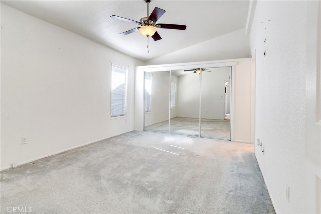 3500 Buchanan Street, Unit 230 Riverside, CA 92503 - Photo 15 of 28 Primary bedroom with mirrored closet doors